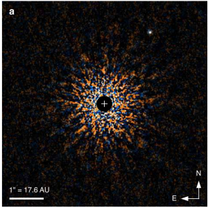 The false-color, infrared image of the GJ 504 system. The star (center) has been blocked out, and the planet appears a white blob at the upper right.