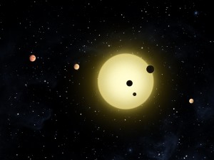 Three planets in the Kepler-11 system as they simultaneously transit their star as imagined by by a NASA artist (Image credit: NASA). From http://ciera.northwestern.edu/Research/highlights/research_highlights.php#ForeignWorlds.